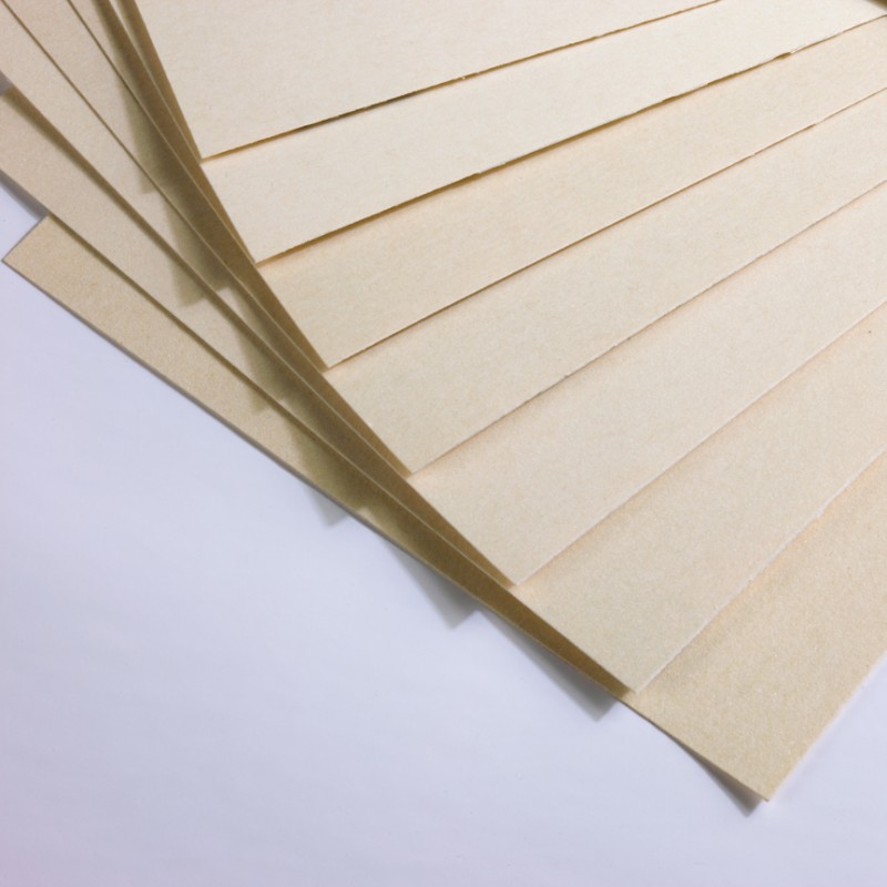 stacks of sanded pastel paper