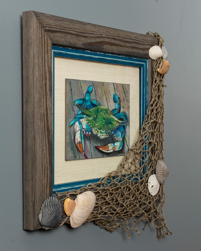 Side view of picture framing of crab painting